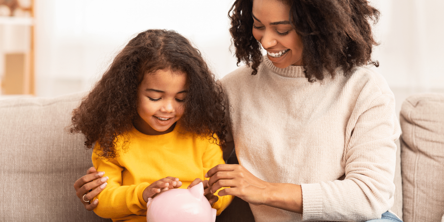 Cheerful Mother Teaching Daughter How To Save More Money At Home