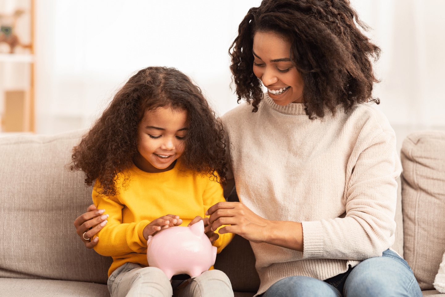 Cheerful Mother Teaching Daughter How To Save More Money At Home