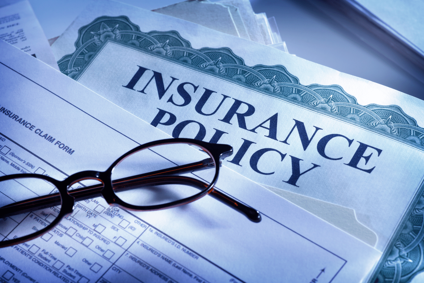 nsurance claim form and insurance policy. Risk Management Concept.