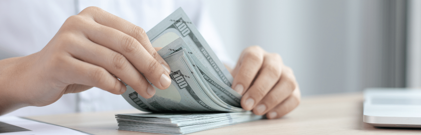 Woman Counting Bills for Financial Savings. Gross Income Concept.