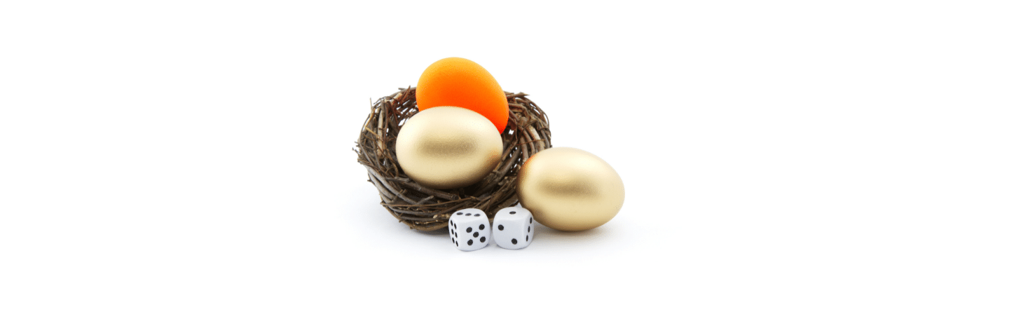 Dice and golden nest egg reflect investment risk. Risk tolerance concept.