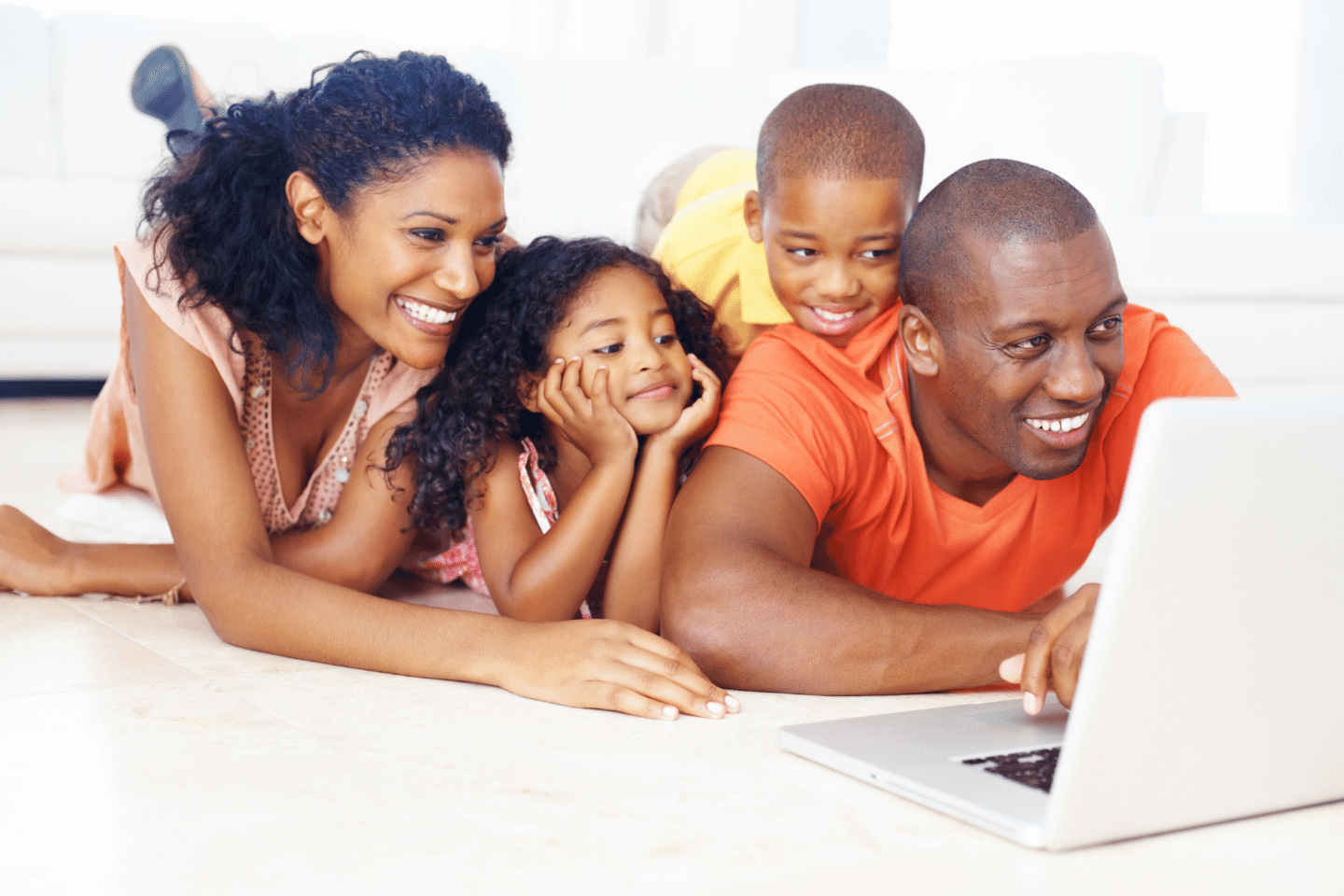 African American family using laptop. Insurance Planning Concept.